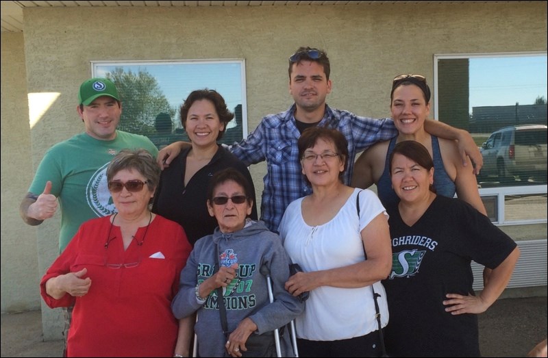 Gertie Montgrand (front row, second from left), née Merasty, celebrated her 80th birthday by skydiving with seven other family members. Along for the trip were (back row, from left) grandson Evan Lentowicz, granddaughter Michelle Leniuk, grandson Joel Montgrand and granddaughter Kari Lentowicz; (front row, from left) niece Veronique Woods, daughter Jan Lentowicz and granddaughter Jeanette Bear.
