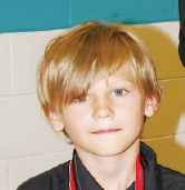 Nels Nordin received the most-improved reader medal for Grade 2C.