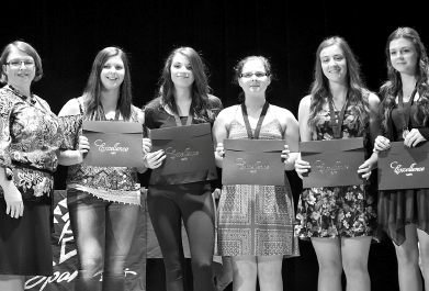AnnaLee Placatka, left, presented the awards of excellence to, from left: Kaylie Bowes, Lexie Tomochko, Kali Wyllychuk, Jaelyn Dietz and Cassidy Aker.