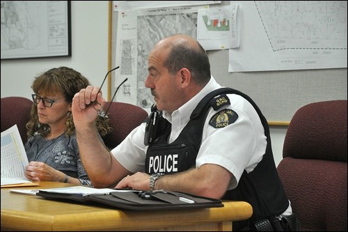 Superintendent John Sutherland of the Battlefords RCMP attended Monday’s town council meeting to present the quarterly statistics and joined in a look back at the events of the past week. Also pictured is Councillor Shelley Boutin-Gervais. Photo by Jayne Foster