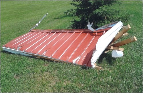 College View Apartments on Diefenbaker Drive were missing a couple of balcony roofs after the brief but violent thunderstorm ripped through the Battlefords Saturday evening. One of the roofs ended up on the North Battleford Comprehensive High School lawn and the other landed about two blocks away behind the school. Photos submitted