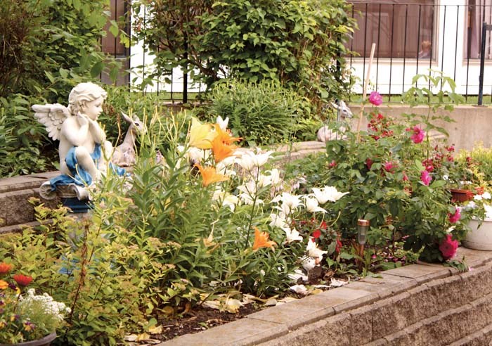 Best Senior Housing Complex, Honourable Mention, Queen Elizabeth II Court courtyard.