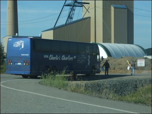 Members of the striking IAM Local 1848 union delay a bus from entering Hudbay property.