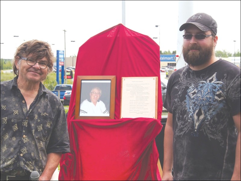 Tom Heine and Jeff Morrison with the frame honouring long-time volunteer Tom Morrison. Tom Morrison was away this weekend, so Jeff attended the party on his behalf. Morrison’s photo will be added to the Wall of Honour at the Flin Flon Station Museum.