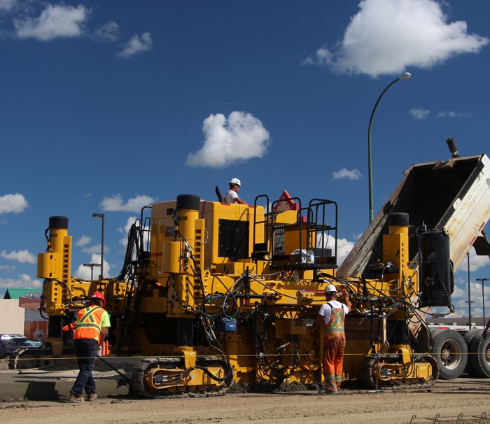 Road Rebuilding – The first concrete roadway in the City of Yorkton gets laid down in front of the Parkland Mall. The road is built by the largely automated machine above, which follows guide strings as the concrete vibrates through and goes through a slip form. The reason is going with concrete is longevity, as the projected life of the road is thirty to forty years. While rain threatened the project, the build otherwise went smoothly.