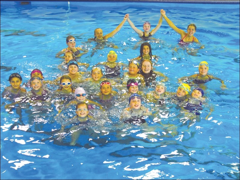 Synchro camp swimmers and volunteer instructors in the Aqua Centre pool on Wednesday afternoon.