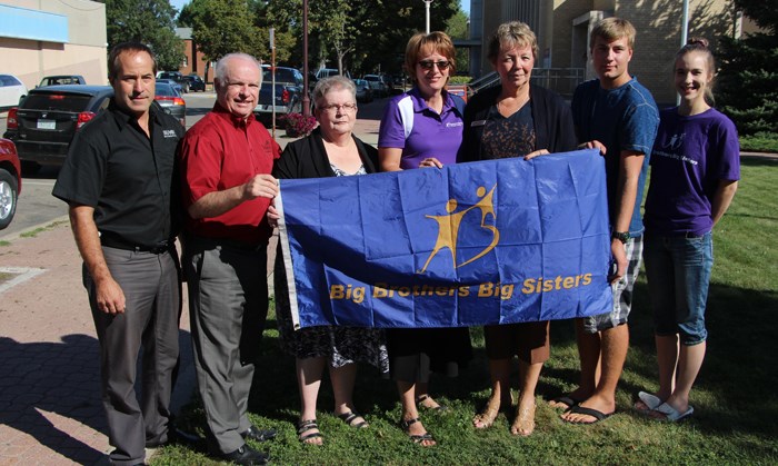Big Brothers Big Sisters – Big Brothers Big Sisters of Yorkton and Area are celebrating BBBS Month, which highlights the difference the mentoring programs make in the lives of area children. A flag was raised at City Hall to commemorate the event. Pictured are Wade Windjack, board member, Mayor Bob Maloney, Lois Smandych, board member, Irma Van De Bon-Nicol, Executive Director, Susan Stewardson, Board President, Wyatt Munson, Board Member, Youth Ambassador and Mentor and Leah McNeill, mentoring coordinator. BBBS is also always looking for mentors, and people interested in getting involved can call 306-782-3471.