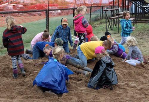 Youth flocked to the sand pit, which is where treasure was buried. Kids dug up loonies during the Stoughton Rough 'N Ready Roughstock Rodeo on Saturday, Sept. 5.