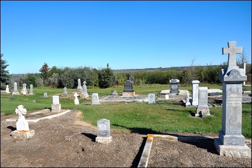 arly graves at risk along the edge of the North Saskatchewan River valley in the northwest corner of the Battleford Cemetery are to be relocated to another part of the cemetery beginning this year. The graves above are located within an area that has been fenced off from the rest of the cemetery. Photos by Jayne Foster