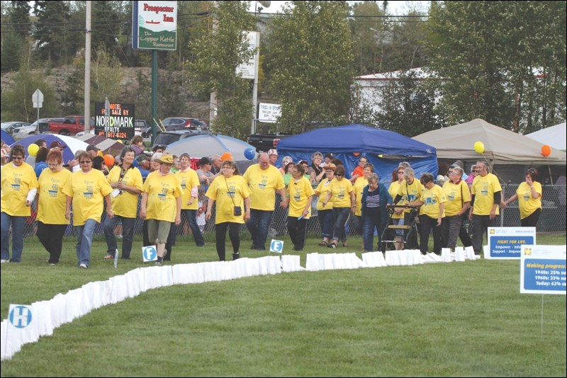Flin Flon and area cancer survivors walked the first lap of the relay together