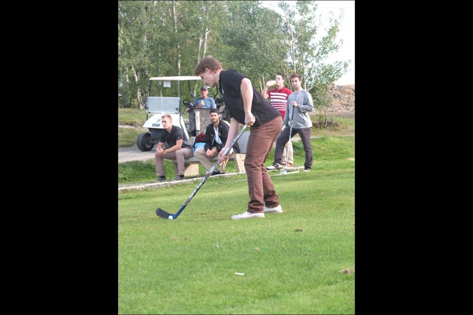 Goalie Brenden Newton shot the ball with a stick as part of one fun challenge.