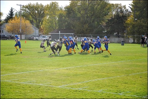 It was a perfect afternoon for football when the John Paul II Crusaders hosted the Kindersley Kobras in nine-man football action. Photos by John Cairns