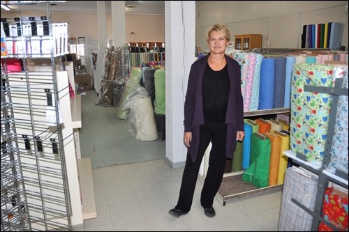 Lois Wilkie, owner of Fabricland, stands inside the new and permanent location in North Battleford at the corner of 103rd Street and Railway Avenue. The entrance faces Railway Avenue and the plan is to put up a sign soon. Photos by John Cairns