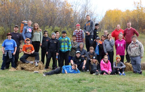 Twenty-seven students in grades eight and nine at Arcola School took part in a camping trip through their Practical Applied Arts class while learning about wildlife and Leave No Trace Camping. “I think the trip was a success,” A.J. Schlenker, a teacher at Arcola School explained. “We hiked in to Saskairie with backpacks full of equipment, food, and clothing (with only one wrong turn)! And once at Saskairie, students were involved in cooking their own meals, setting up tents and shelters, participating in initiative tasks and games, and trying out a few things like atlatl and dart throwing, and an 'outdoor Olympics.' Overall it was a chilly, but successful camping trip.”