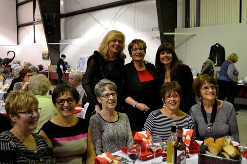 In its eighth year, Darlene Olsen's Creative Tables for Cancer fundraisers have raised over $400,000 for the “Look Good, Feel Better” program and more recently, local health recruitment programs. This year's event attracted women from throughout southeast Saskatchewan who filled 42 extravagantly-themed tables at Arcola's Prairie Place Hall. This year, Olsen (back row, centre) was joined by Sherry Abbott (back row, left), Executive Director of the Canadian Cosmetic, Toiletry and Fragrance Association Foundation and (back row, right) Dawn Gerry of the Mary Kay Ash Charitable Foundation, Canada. They were joined (front row) by a few of Foam Lake's “Breast Friends” charity cookbook authors-Nat Dunlop, Jean Johnson, Linda Helgason, Val Helgason and Anne Reynolds, who donated over 400 cookbooks for the event.(