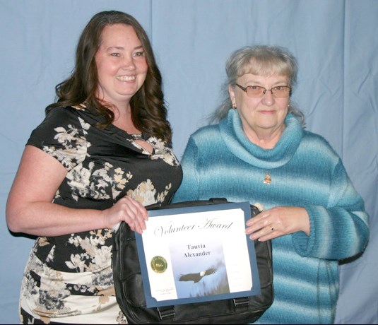 Creighton volunteer Tauvia Alexander (left) with Lorene Bonnett.