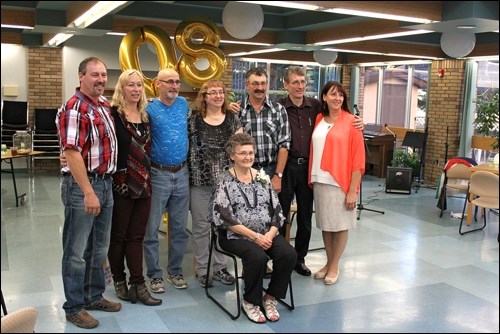 Irene Kuffert celebrates 80 years with her family — Vic Kuffert, Julie Price, Allan Kuffert, Dianne Kuffert, Eric Kuffert, Dave Kuffert and Vicky Smart. Missing is Tim Kuffert. Photo submitted by Alan Laughlin