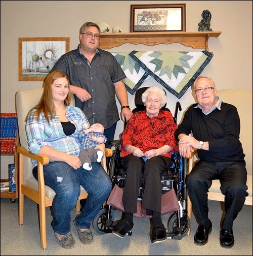 Five Generations  — Thanksgiving weekend brought together five generations at River Heights Lodge. In the photo are Doris Muir, who is seated in the centre. To her left is Ray (Karen) Muir. Standing is Mark (Sheri Nachtegaele) Muir. Seated at the right is Morgan Muir holding Kaiden Rosebrook. Kaiden’s father is Travis Rosebrook. Photo submitted
