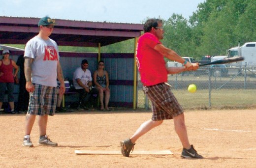 Brett Meberg hit the ball into the outfield during the slo-pitch tournament held during the Preeceville Western Weekend.