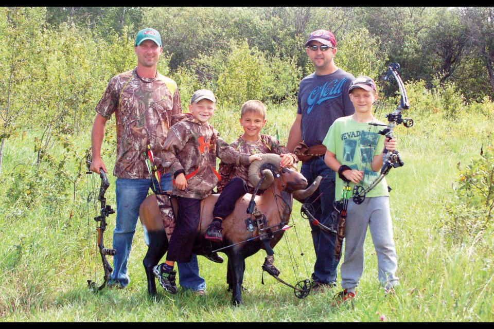 Archery shoot: Families were encouraged to participate in the 3-D archery shoot on August 15 and 16. From left, were: Derek Ryczak, Parker Ryczak, Cole Masley, Kelly Masley and Skylar Ryczak.