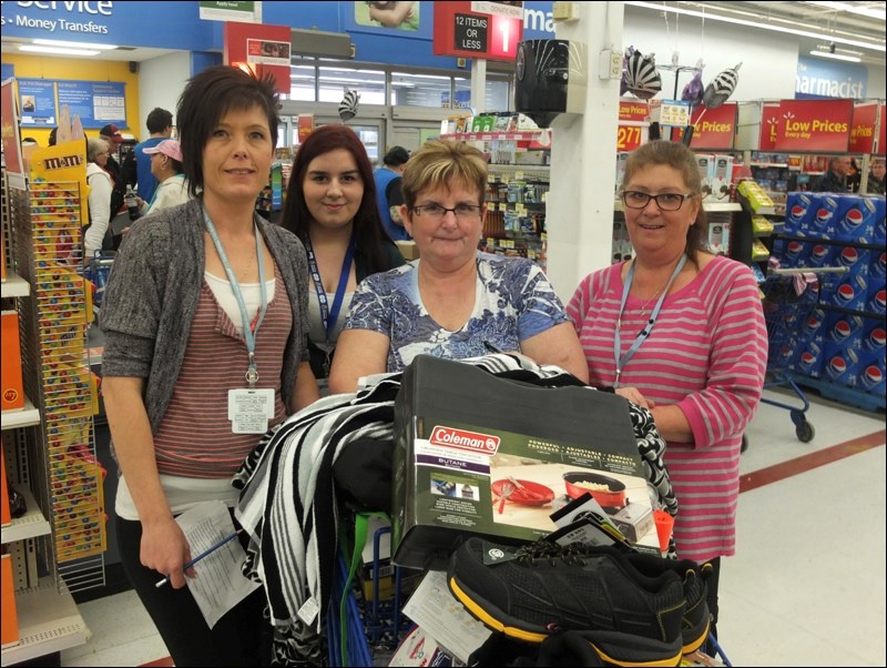 Winning the challenge were the Walmart Explorers, from left, Amanda Fleury, Kristina Cowley, Thursa Criddle and Tammy Lavoie.