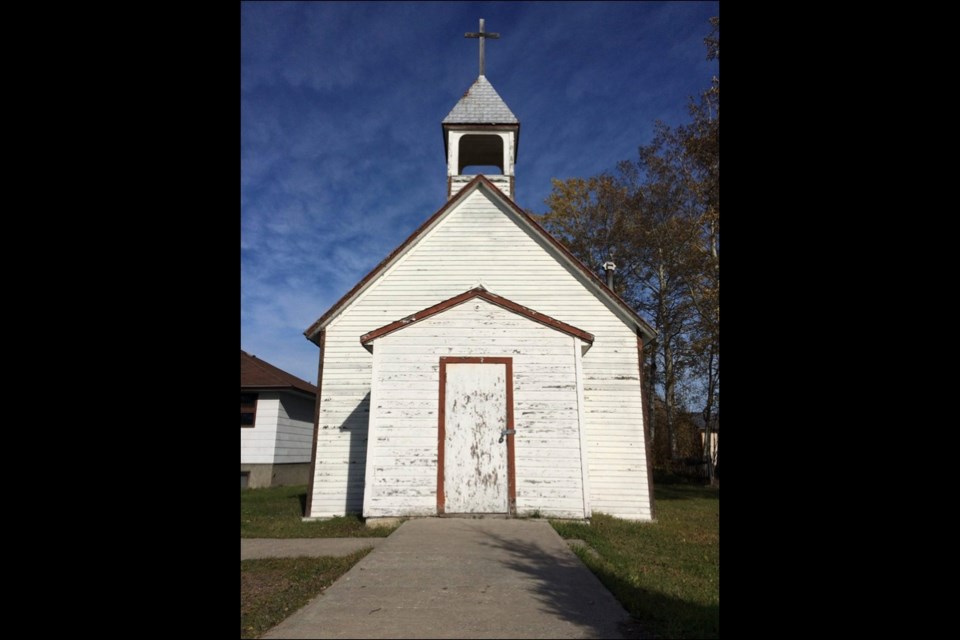 Cranberry Portage’s historic Canadian Martyrs Roman Catholic Mission Church before its demolition.