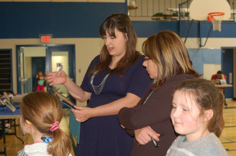 Technology in the Preeceville School is always changing. Laura Chartrand explained some of new technology to Dodi Paterson.