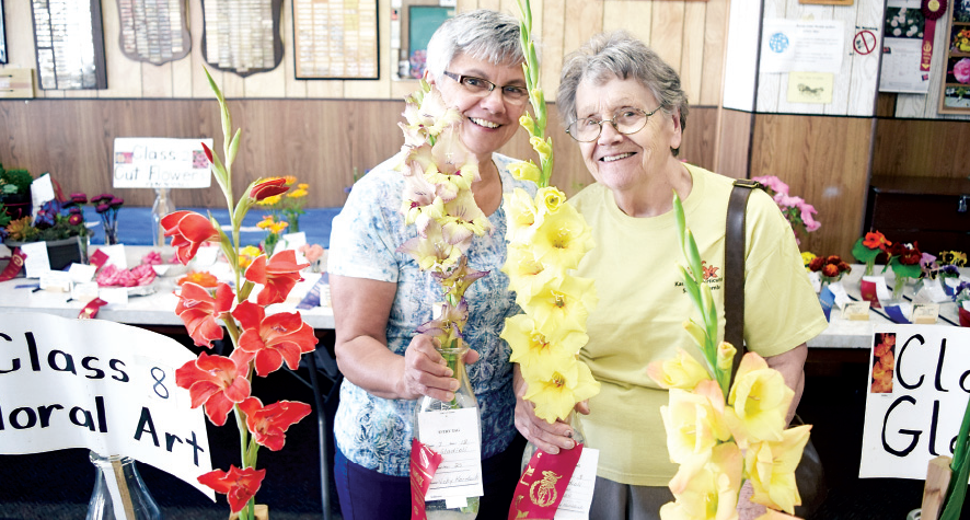 Vicky Koreluik, right, was the grand aggregate winner of the Kamsack Horticulture Society’s annual show on Friday. With her and two of the gladioli exhibits for which she won ribbons was her daughter Linda Patterson of Winnipeg.