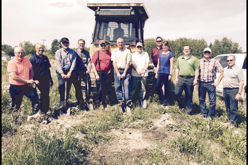 Gateway Co-op board and Federated Co-operative members held a groundbreaking ceremony on August 4 to kick off the beginning of the construction on the new cardlock site located on the east side of Preeceville. From left, were: Lyle Olson, board member; Dana Antonovitch, general manager; George Stinka, board member; Dan Fairburn, Preeceville Co-op branch manager; Mike Zeeben, board member; Wayne Barsby, board member; Herb Carlson, board member; Terry Vanmackelberg, Federated Co-op member; Susan McMartin, Federated Co-op; Sean Sullivan, Federated Co-op; Mike Rawlyk, Mainline Industries; and Murry Carylyle from Stantec.