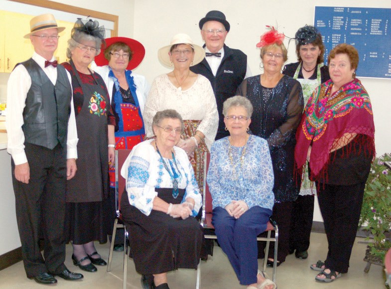 Members of the Preeceville and District Heritage Museum board sponsored an ethnic dessert evening and a celebration of its 10th anniversary and windup on September 25. From left, were: (back row) John Carlson, Leona Carlson, Agnes Murrin, Sharon Buchinski, Lorne Plaxin, Darlene Medlang, Joan Peel, Carol Gawrelitza and (front) Mary Petrowski and Marge Plaxin.