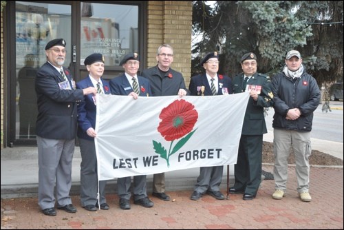 Nov. 5 to 11 is Veterans’ Week remembering the sacrifice of Canada’s veterans in military activities around the world. Monday morning a flag was raised at City Hall in recognition of the week. On hand were Royal Canadian Legion provincial chair Ray Marjoram, Legion executive Marilyn Clark, Legion Branch No. 70 president Oral Fladeland, Mayor Ian Hamilton, World War II veteran Shorty Duhaime and Afghanistan veterans Byron Rodriguez and Mike Pratt.