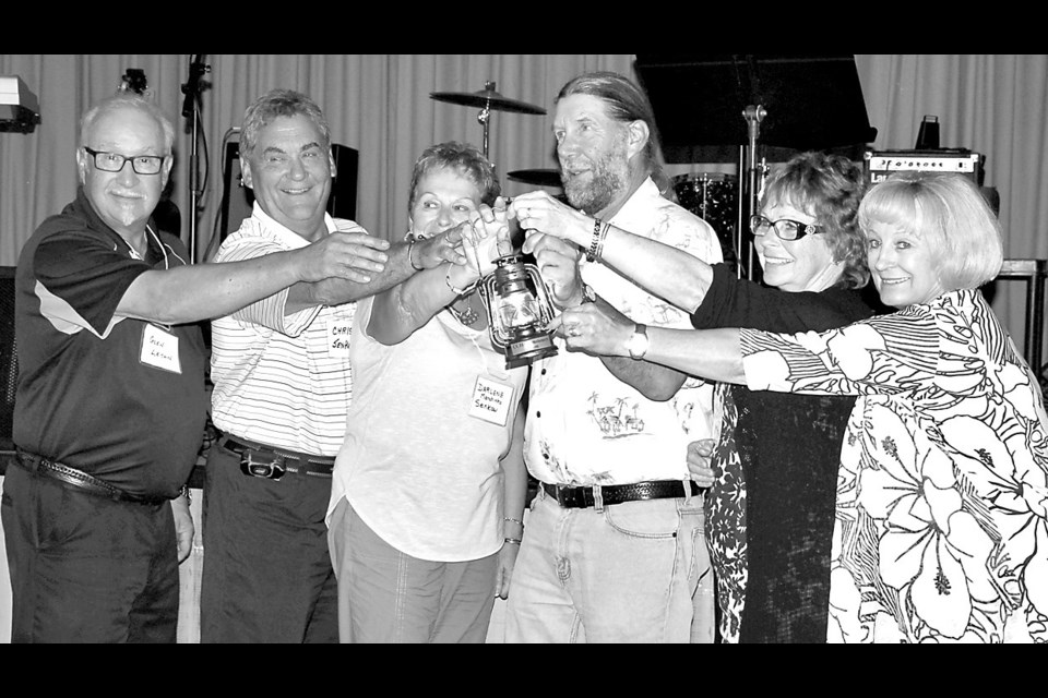 The Pensioner’s Prom, a concept which began last year, was focused on the Class of 1968 this year. In a ceremonial gesture, Alvin Boyko, Sharon (Romaniuk) Sobkow and Linda (Cymbalisty) Skomorowski (on the right representing those born in 1950) passed the torch to Glen Leson and Chris and Darlene Senkow who represent the students born in 1951 and will organize the Pensior’s Prom next year.