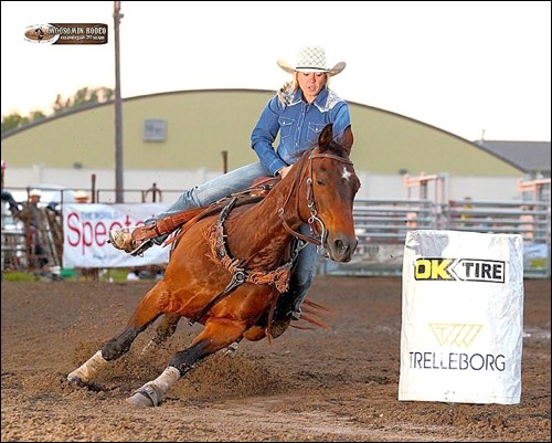 Twila Zunti puts Chex through his paces. Photo by Lewis Images