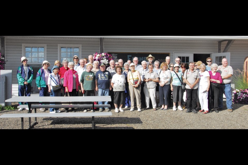 The Winnipeg tour group gathered for a photograph in front of the Canora Visitor Centre/CN Museum on Wednesday. The group arrived by VIA train in Canora Tuesday evening. They stayed overnight in Canora before seeing a number of sights in Canora and in Veregin on Wednesday. After a big meal at the Visitor Centre, the group boarded a bus to Yorkton and eventually made its way to Melville where it boarded a train back to Winnipeg.