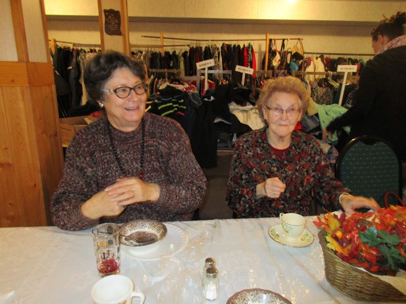 Lorraine Katelnikoff, left, of Canora and Helen Heskin of Norquay enjoyed sandwiches and a bowl of soup at the Norquay Emmanuel Lutheran Church semi-annual rummage, tea and bake sale.