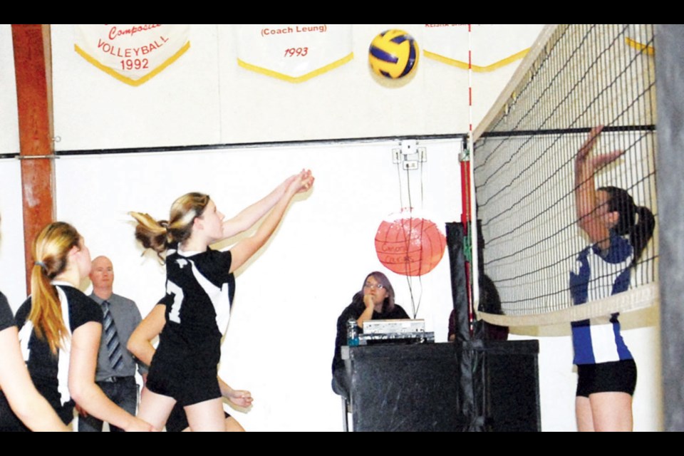 Taralee Bazarski made sure she got the ball over the net during a rally in the game against Preeceville.
