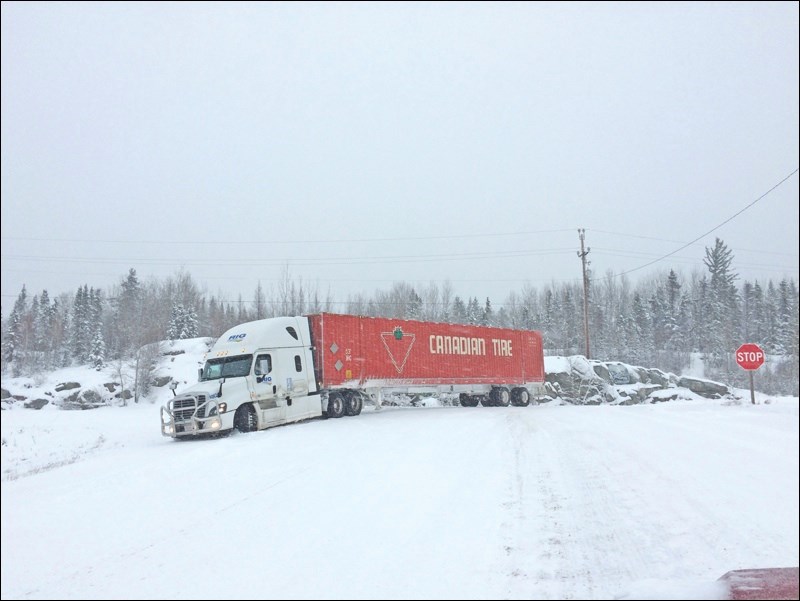 A Canadian Tire semi stuck at the highways 10 and 10A intersection on Wednesday afternoon.