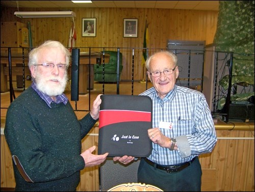 Lion President John Buswell with Harold Empey at an information night Nov. 18 in Borden.