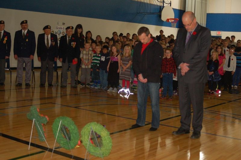 Chris Balyski, GSSD board member, left, and Doug King, principal, laid a wreath at the Remembrance Day service held at the Preeceville School on November 10.