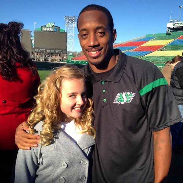 Paige Hansen, Children's Wish Foundation Ambassador, was in Regina at Mosaic Stadium to accept a cheque for $5,000 from Saskatchewan Roughrider Terrell Maze. The presentation took place on November 12.