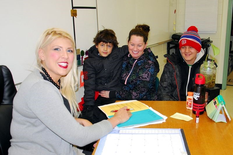 On November 18, Liam Desrosiers (right) was accompanied by his mother, Tanya, and his little brother, Michael, for a parent-teacher interview with his Grade 7 teacher, Alexandria Blatter at the Canora Composite School.