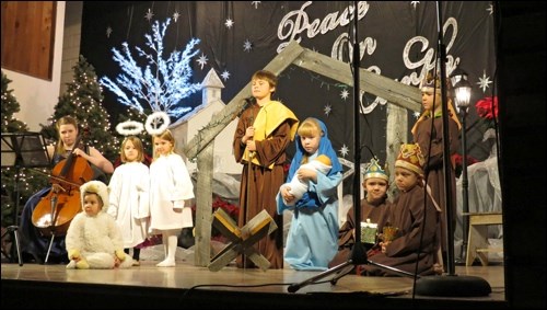 Children performed a nativity scene while Zaide Masich played the cello. Photos submitted