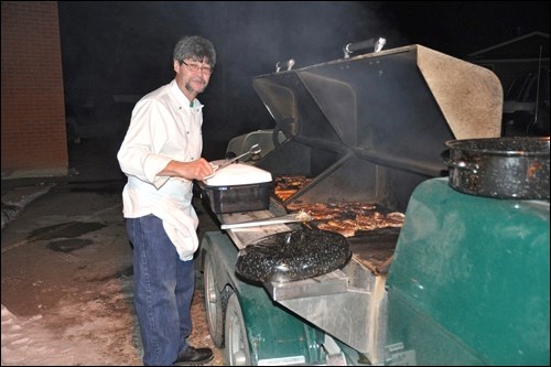 Retired executive chef Cam Gee cooking 175 steaks for the First Responders Appreciation event Saturday. Photos by Jayne Foster