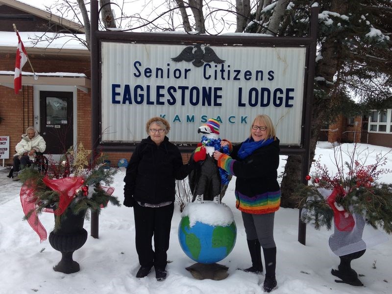 Debbie Cuervo, right, helped Anne Drancejko decorate the Eaglestone Lodge eagles for Christmas.