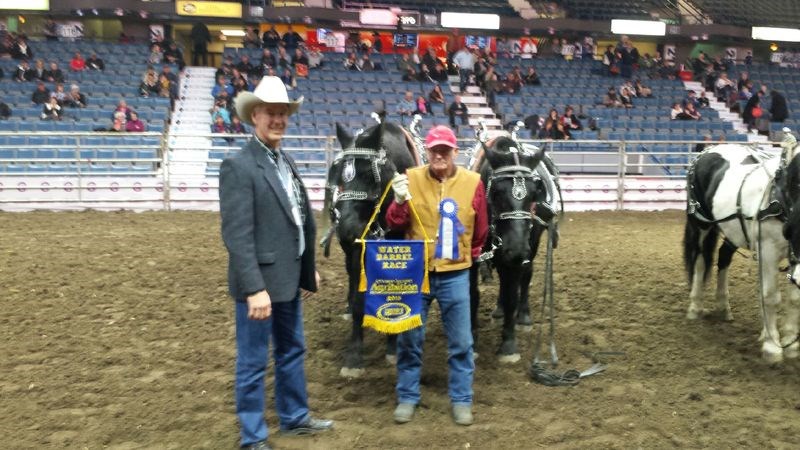 Lloyd Smith of Pelly, operating his team of Tom and Jiggs won first place in the water race during Agribition in Regina at the end of November.