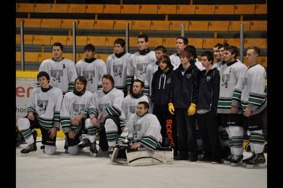 The Estevan midget Tower Wolves celebrate their B-side home tournament championship after defeating the Assiniboia Stingers 7-4 in the final at the Civic Auditorium.