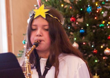 Contemporary Christmas - St. Paul Lutheran Church held its annual Sunday School Christmas Concert Sunday morning. In addition to their traditional nativity story, children from the Sunday school showcased their musical talents by playing Christmas songs on various instruments. Halle Shingoose was one such musician, playing a double part as an angel.