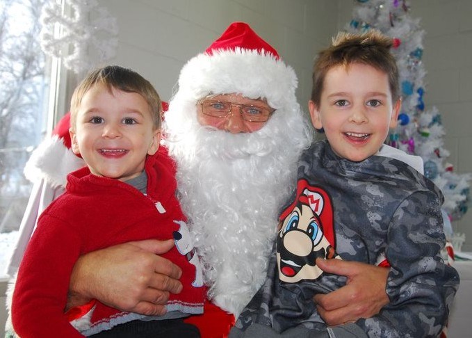 Nicholas (2) and Jacob (5) Rewakowsky were all smiles whey they got to sit on Santa's knee and tell him what they wanted for Christmas. They met Santa at the Canora Wheatland Lioness Club's Breakfast with Santa on December 6.
