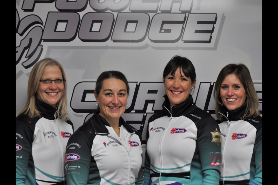 Amber Holland, left with Team Schneider at a provincial Scotties qualifying event at the Power Dodge Curling Centre in December, is teaching at a curling clinic in Estevan on Feb. 12.