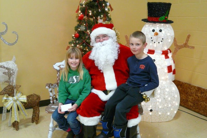 Mia and Lane Butterfield enjoyed a visit with Santa Claus when he came to Norquay.